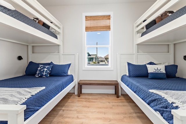 bedroom with wood-type flooring