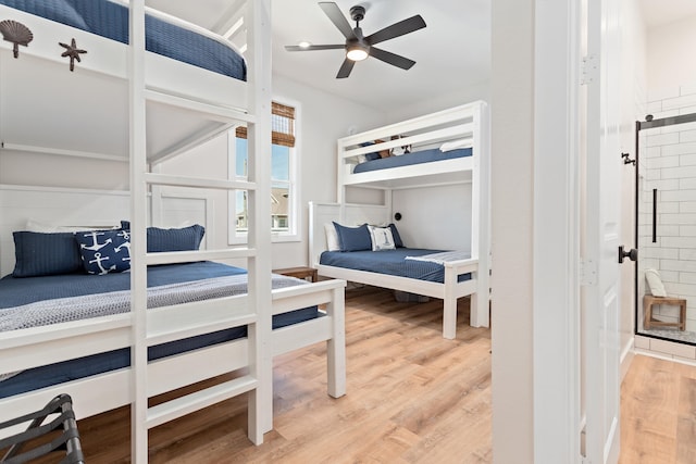 bedroom with ceiling fan and wood-type flooring