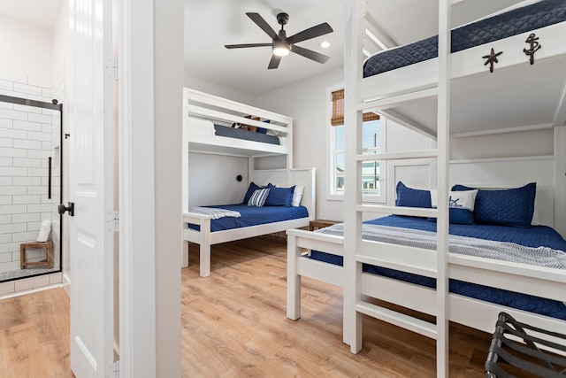 bedroom with wood-type flooring and ceiling fan