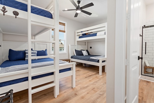 bedroom featuring wood-type flooring and ceiling fan