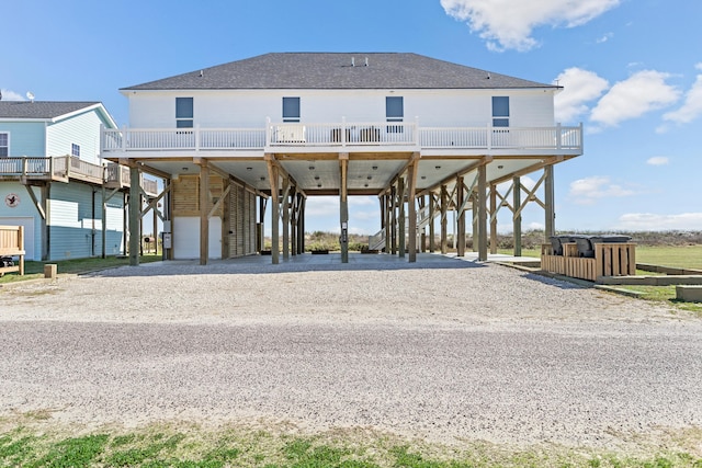 exterior space featuring a carport