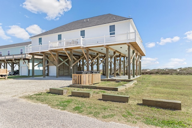 exterior space with a garage and a yard