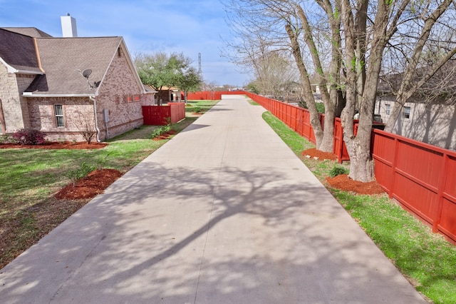 surrounding community featuring a yard