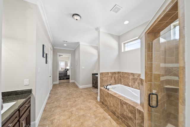 bathroom featuring vanity, ornamental molding, and separate shower and tub