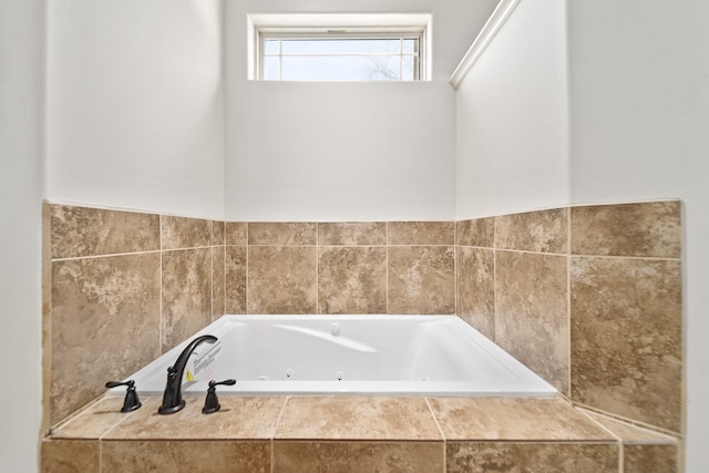 bathroom with tiled tub