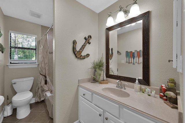 full bathroom with toilet, tile patterned flooring, shower / bath combo with shower curtain, and vanity