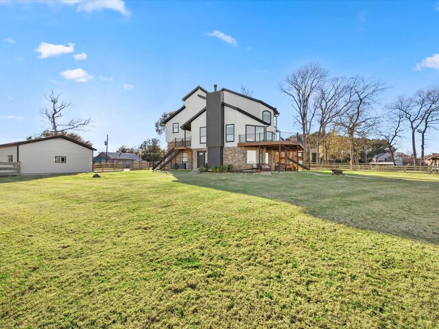 view of yard with a wooden deck