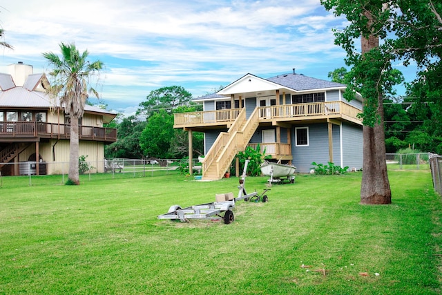 back of property featuring a lawn