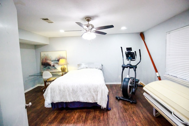 bedroom featuring ceiling fan and dark hardwood / wood-style floors