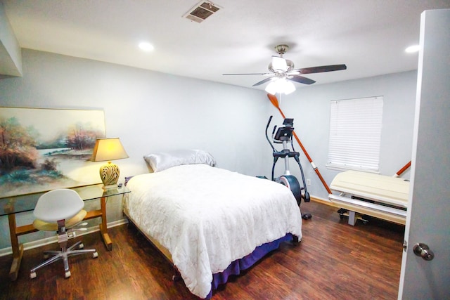 bedroom with ceiling fan and dark hardwood / wood-style floors