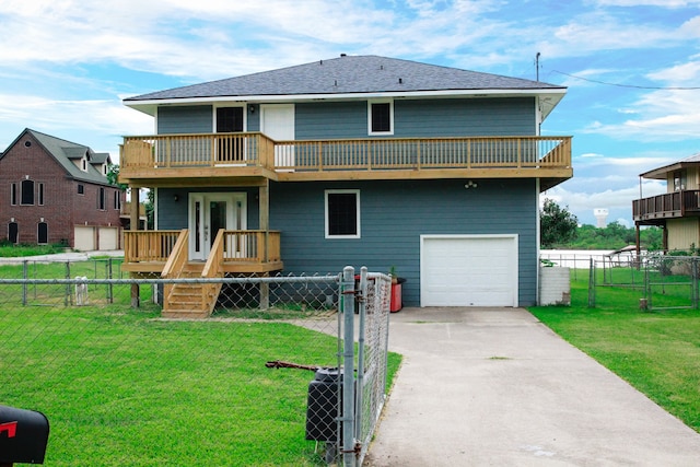 view of front of property with a front lawn and a balcony