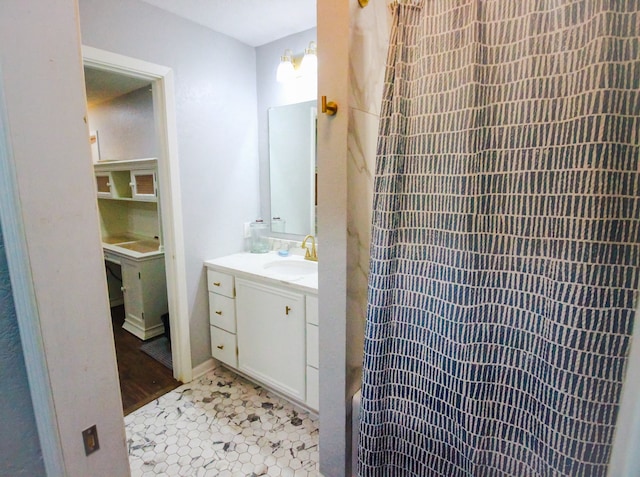 bathroom with tile flooring and oversized vanity