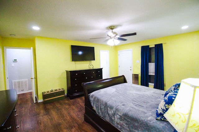 bedroom featuring ceiling fan and dark hardwood / wood-style floors