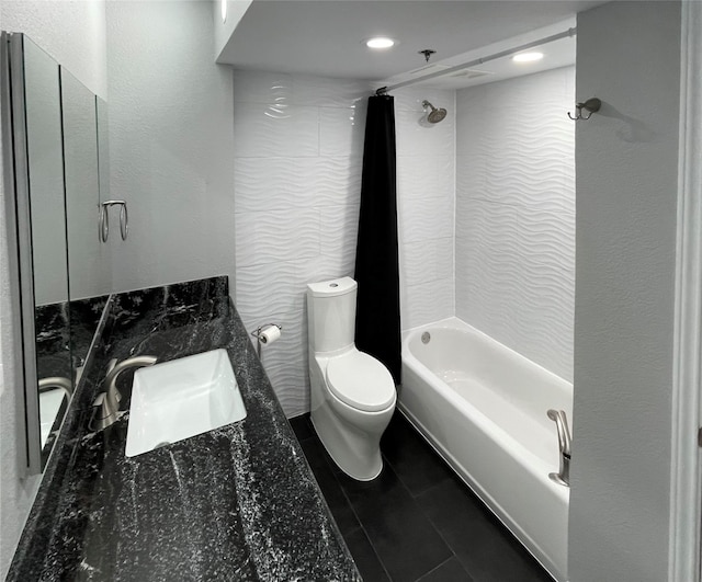 full bathroom featuring toilet, vanity, shower / bath combination, and tile flooring