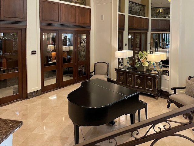 game room featuring light tile flooring