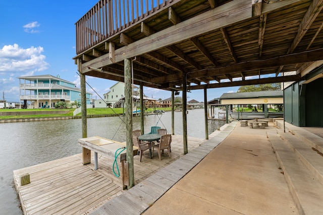 dock area featuring a water view