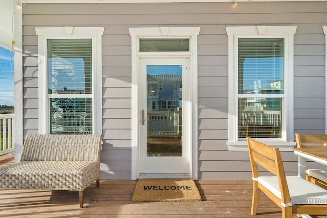 doorway to property with a deck