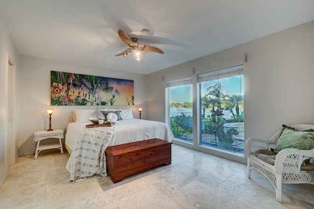 bedroom featuring access to exterior and ceiling fan