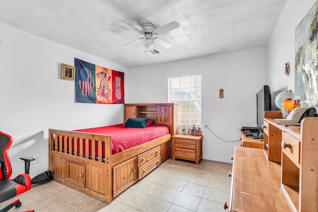 bedroom featuring light tile floors and ceiling fan