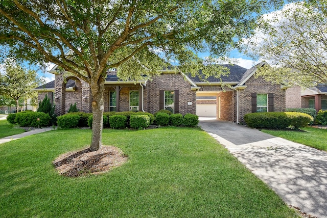 ranch-style home featuring a front yard and a garage