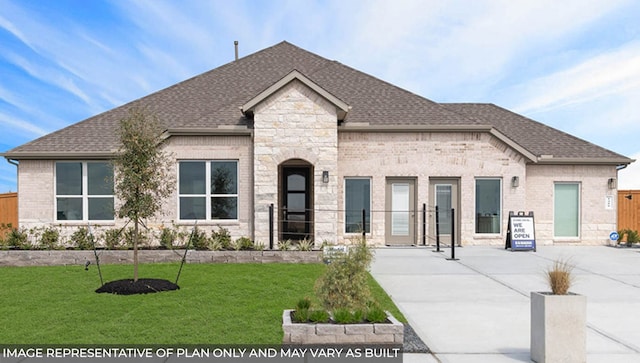 view of front of home with a front yard