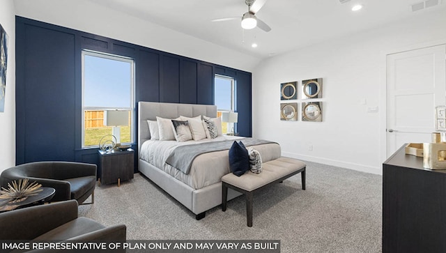 carpeted bedroom featuring ceiling fan and lofted ceiling