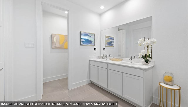 bathroom featuring tile patterned flooring and vanity