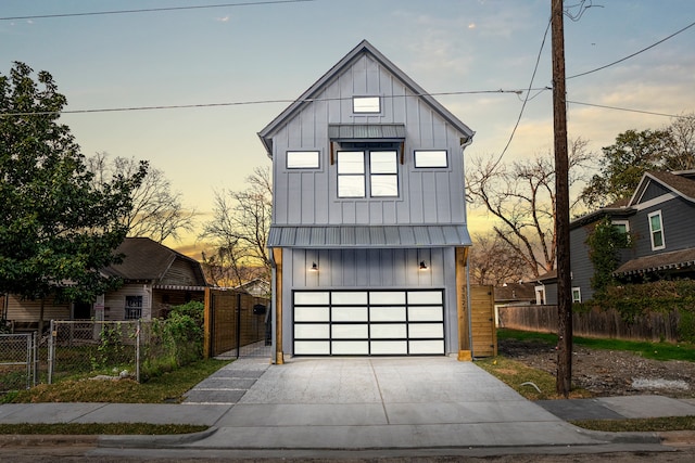 modern farmhouse style home featuring a garage