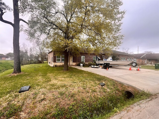 exterior space with a front lawn