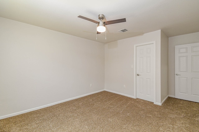 unfurnished bedroom with ceiling fan, a closet, and carpet flooring