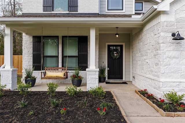 entrance to property with covered porch