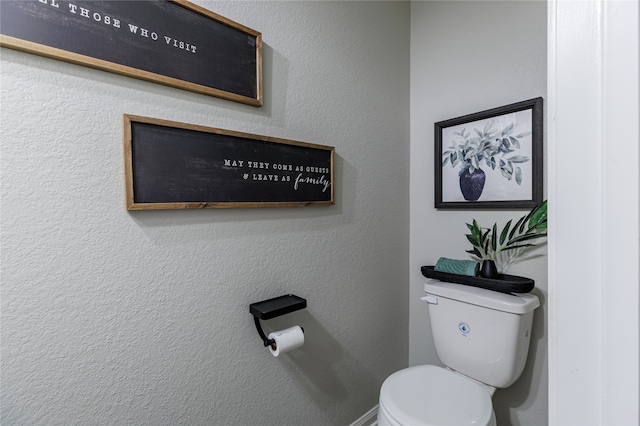 bathroom featuring toilet