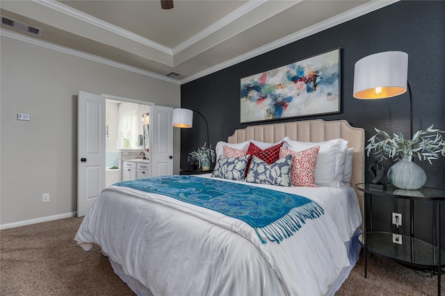 carpeted bedroom with ceiling fan, ornamental molding, and connected bathroom