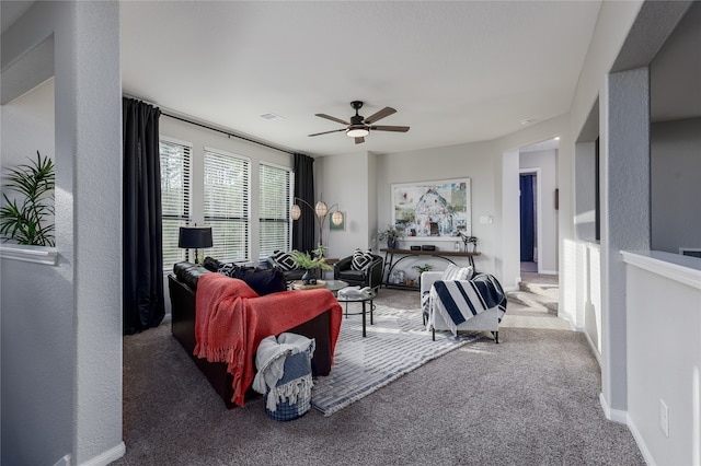 bedroom with ceiling fan and carpet