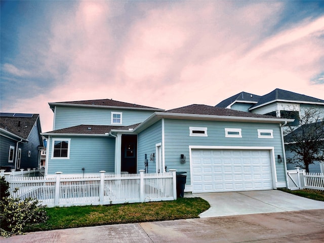 view of front of home featuring a garage