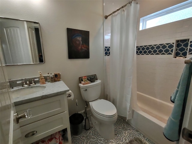 full bathroom with tile floors, toilet, oversized vanity, and shower / bath combo with shower curtain