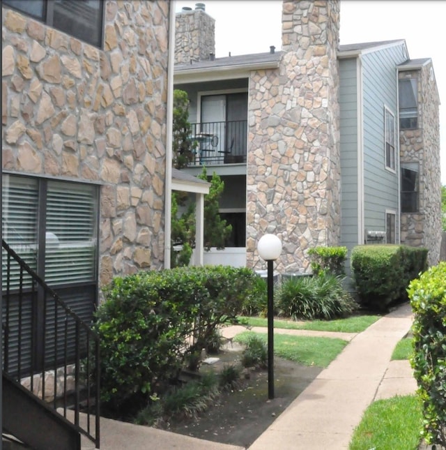 exterior space with a balcony