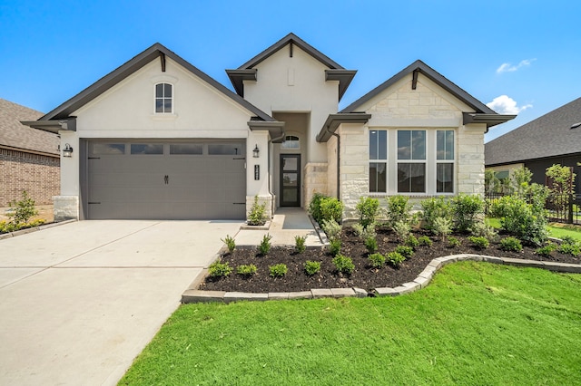 view of front of property with a front lawn and a garage