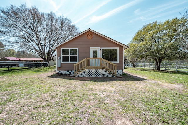 view of front of home with a front lawn