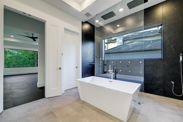 bathroom with ceiling fan and tile flooring