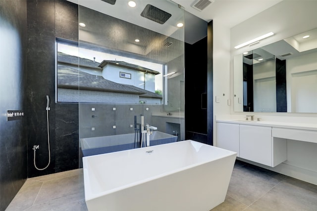 bathroom with tile floors and vanity