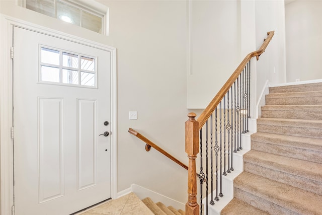 entryway with light tile flooring