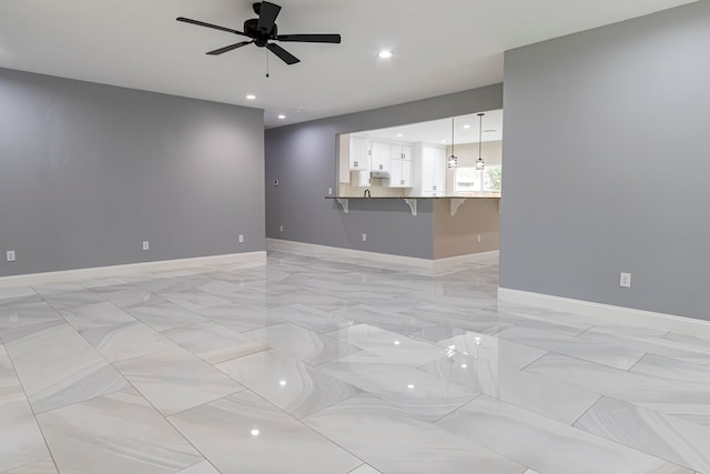 living room featuring ceiling fan