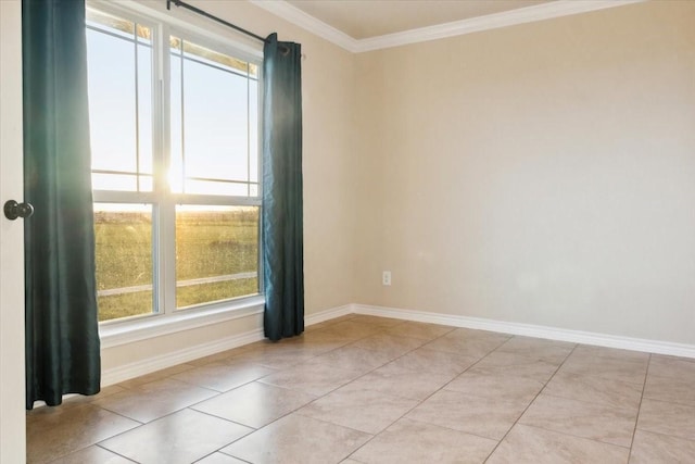 tiled spare room featuring crown molding and a wealth of natural light