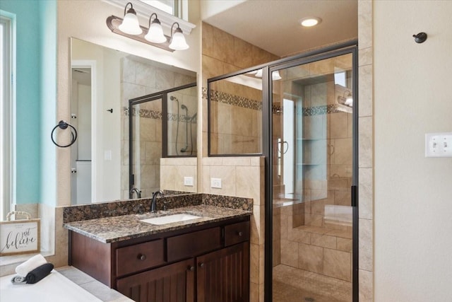 bathroom with vanity and walk in shower