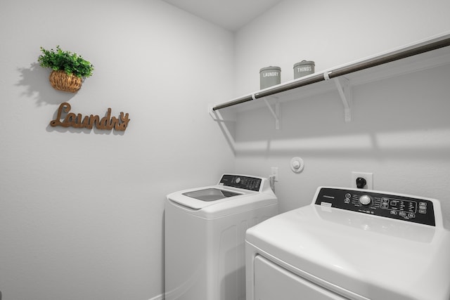 laundry area featuring washer and clothes dryer