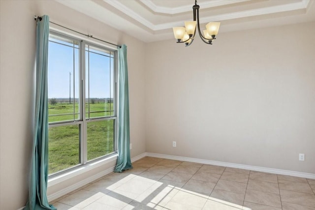 unfurnished room with a raised ceiling, light tile patterned floors, and a notable chandelier