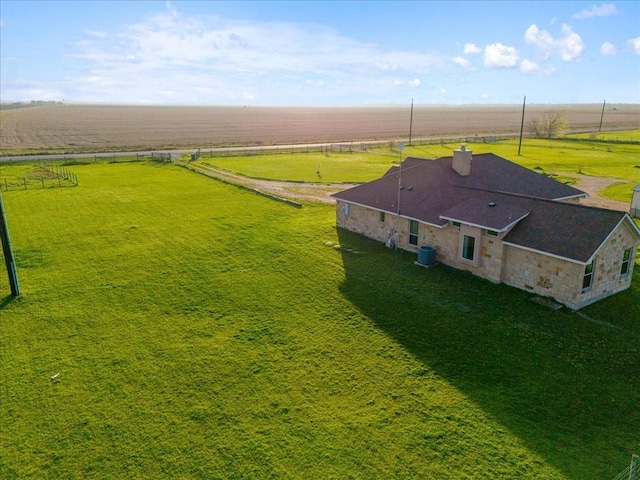 birds eye view of property featuring a rural view