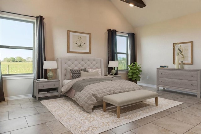 bedroom featuring ceiling fan, light tile patterned flooring, and high vaulted ceiling