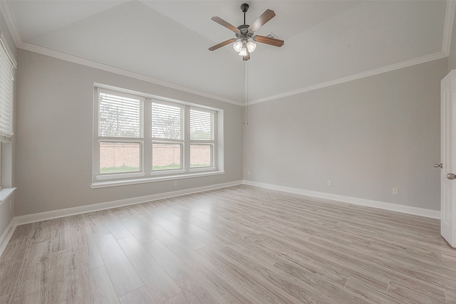 empty room with light hardwood / wood-style floors, ceiling fan, vaulted ceiling, and ornamental molding